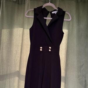 Chic Black Sleeveless Jumpsuit with Pearl Accents